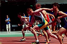 Action shot of Ault-Connell (shown centre, in Australian green and gold) during track competition at the 2000 Summer Paralympics 261000 - Athletics track Kieran Ault-Connell action - 3b - 2000 Sydney race photo.jpg