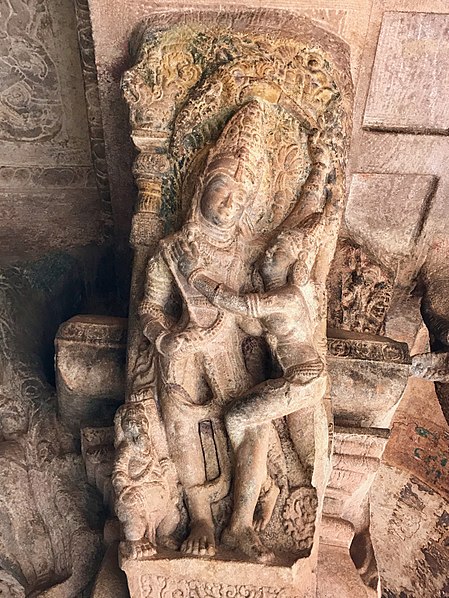 File:6th century amorous couple on pillar top looking below in Cave 3, Badami Hindu cave temple Karnataka 3.jpg