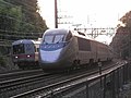 Een Metro-North trein en een Acela Express