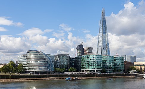 View of the City Hall (round building on the left), More London office complex and The Shard skyscraper, at the south bank of the Thames, Southwark district, Central London, England. The City Hall was opened in 2002 and comprises the Mayor of London and the London Assembly.