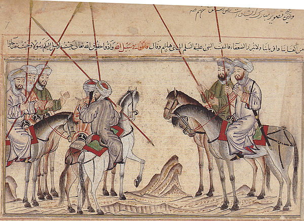 Early 14th century depiction of Muhammad encouraging his followers before the Battle of Badr