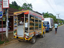Rear view (from right side) of the same bakery micro-van in Sri-Lanka