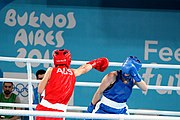 Deutsch: Boxen bei den Olympischen Jugendspielen 2018 Tag 12, 18. Oktober 2018 - Finale Leichtgewicht Mädchen – Oriana Saputo (Argentinien, blau) schlägt Emma Lawson (Australien, rot) 5-0; Ringrichter ist José Romero (Spanien). English: Boxing at the 2018 Summer Youth Olympics on 18 October 2018 – Girls' lightweight Bronze Medal Bout – Oriana Saputo (Argentina, blue) wins over Emma Lawson (Australie, red) 5-0; Referee is José Romero (Spain). Español: Boxeo en los Juegos Olímpicos Juveniles de Verano de 2018 en 18 de octubre de 2018 - Combate de medalla de bronce de las niñas: Oriana Saputo (Argentina, azul) gana a Emma Lawson (Australie, roja) 5-0; Árbitro es José Romero (España).