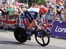 Wiggins won gold in the time trial at the 2012 Summer Olympics, becoming Great Britain's most decorated Olympian with seven medals - four of them gold. Bradley Wiggins, London, 2 August 2012 (cropped).jpg