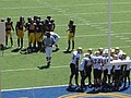 The Colorado Buffaloes in a huddle during a road game against the California Golden Bears. The Golden Bears won 52-7.