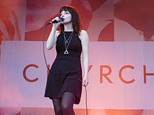 Chvrches performing at Ottawa Bluesfest 2015, where they debuted three songs from the album CHVRCHES at Bluesfest 2015.jpg