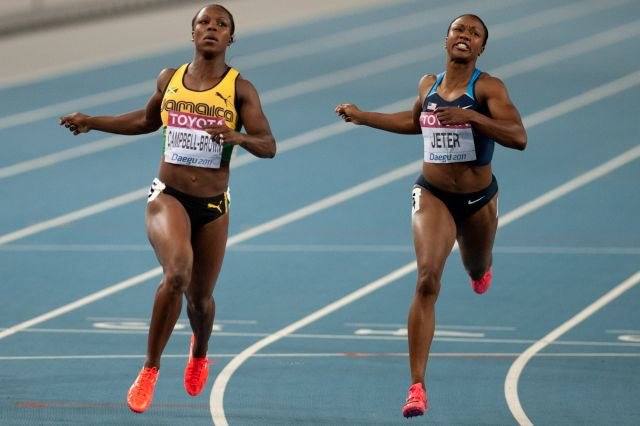 The finish of the women's 200 metre race at Daegu, Veronica Campbell-Brown ahead of Carmelita Jeter.