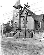 This building in the western part of Fremont was originally (1890) short-lived Lake Union Presbyterian Church is shown here in 1910 as a Mormon church; two years after that, the building was demolished. It was one of roughly half a dozen Seattle Presybterian churches built on the same "stock" building plan.