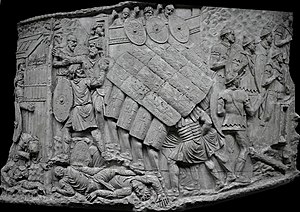Roman soldiers in "tortoise" formation Colonne trajane 1-57 (cropped).jpg