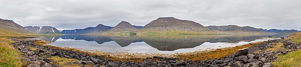 4-frames panorama of Dýrafjörður, one of the fjords comprising the Westfjords and situated between the fjords Arnarfjörður, in the South and Önundarfjörður, in the North. Dýrafjörður belongs to the municipality of Ísafjarðarbær and the fjord is 9 km wide and stretches 32 km into the land.