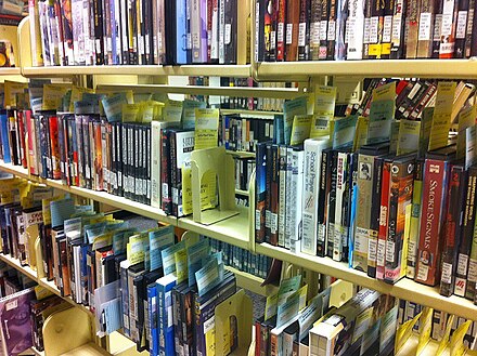 A library offering physical media such as DVDs, which has been used in a long time.