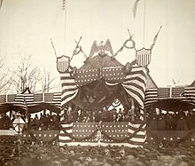 The Inaugural Parade on Pennsylvania Avenue passes the presidential reviewing stand in front of the White House in March 1881. Garfield inauguration.jpg