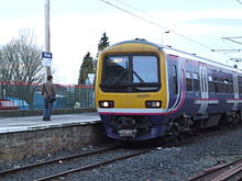 A Hunslet Transportation Projects built Class 323 entering Glossop railway station GlossopStation4829.JPG