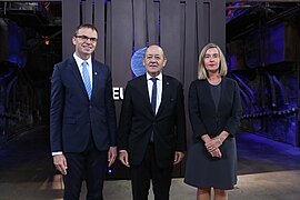 Informal meeting of ministers for foreign affairs (Gymnich). Handshake Sven Mikser, Jean-Yves Le Drian and Federica Mogherini (36893618426).jpg