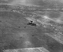 A Curtiss Jenny on a training flight Jenny dive.jpg