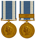 Medaille en medaille met gesp