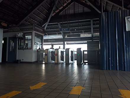 Turnstiles at Quirino station in 2018.