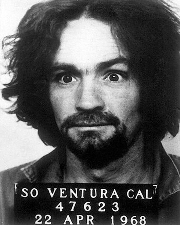 Charles Manson mugshot, photographed around the time he first met Wilson