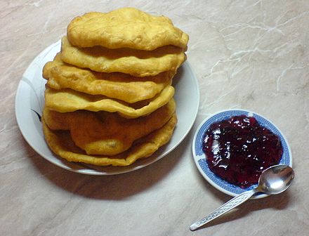 A stack of mekitsas with jam