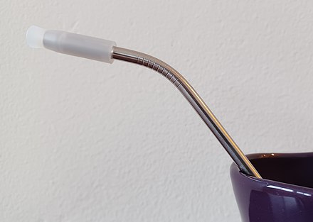 A reusable metal straw with a silicone tip