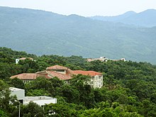 Mizoram University with surrounding tropical forests in the campus Mizoram University DSCN3193.jpg