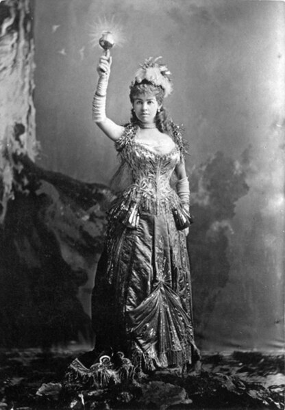 In costume as "The Electric Light" at a ball on March 26, 1883
