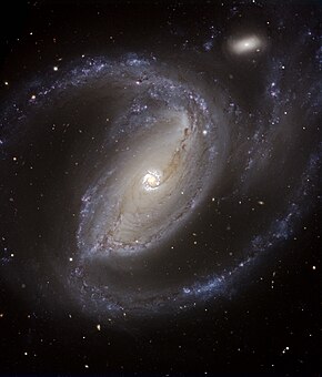 Spirální galaxie s příčkou NGC 1097 na snímku z dalekohledu VLT (ESO) v Chile.