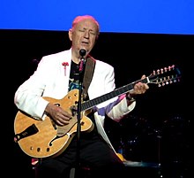 Former Monkees guitarist Michael Nesmith playing his signature model Gretsch Model 6076 NesmithLive2018.jpg