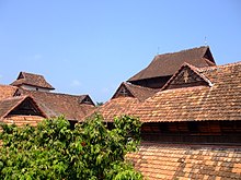 The gabled roof and ceiling works are the prime feature of Kerala architectural style. Padmanabhapuram Palace, roof works.jpg