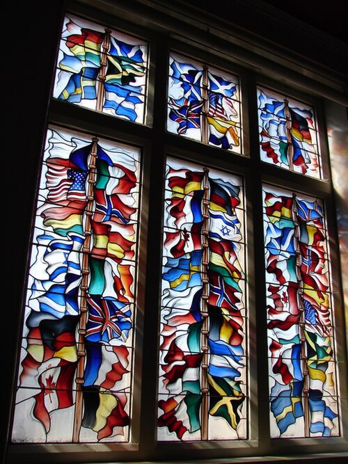 An example of the pre-1994 flag of South Africa being used for historical purposes. This is a stained-glass window in Lockerbie Town Hall in Scotland,