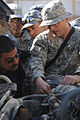 Paratroopers train National Police mechanics on vehicle maintenance DVIDS142791.jpg