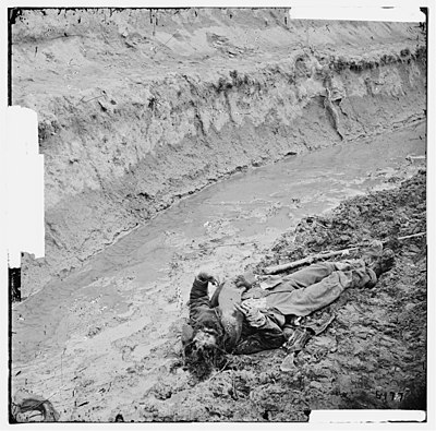 Petersburg, Virginia. Dead Confederate soldier in the trenches of Fort Mahone LOC cwpb.02542.jpg