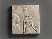 Plaque with head and shoulders of a priestly figure and Sobek; 400-30 BCE; limestone; height: 27.5 cm, width: 25.5 cm; Metropolitan Museum of Art (New York City)