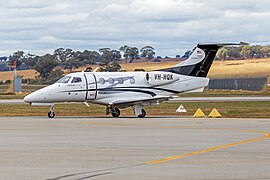 Property Maintenance Australia Pty Ltd (VH-HQK) Embraer Phenom 100EV, operated by Navair, taxiing at Wagga Wagga Airport (2).jpg