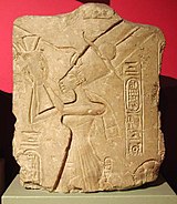 Nefertiti worshipping the Aten. She is given the title of Mistress of the Two Lands. On display at the Ashmolean Museum, Oxford. Queen Nefertiti, Limestone relief.jpg