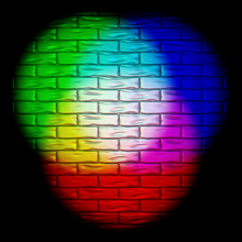 Additive color mixing: projecting primary color lights on a white surface shows secondary colors where two overlap; the combination of all three primaries in equal intensities makes white. RGB combination on wall.png