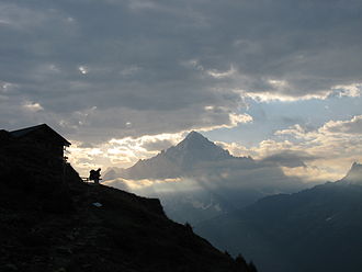 A walker preparing to leave the Refuge de Bel Lachat, Chamonix, in the French Alps, on the long-distance path GR5 Refuge Bel-Lachat gr5 Chamonix.jpg