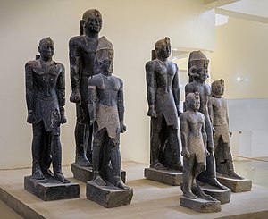 Statues of various rulers of the late 25th Dynasty–early Napatan period. From left to right: Tantamani, Taharqa (rear), Senkamanisken, again Tantamani (rear), Aspelta, Anlamani, again Senkamanisken. Kerma Museum.[1] of Twenty-fifth Dynasty of Egypt