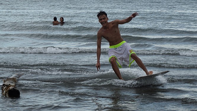 Skim with an awesome smile in Butuan Bay.