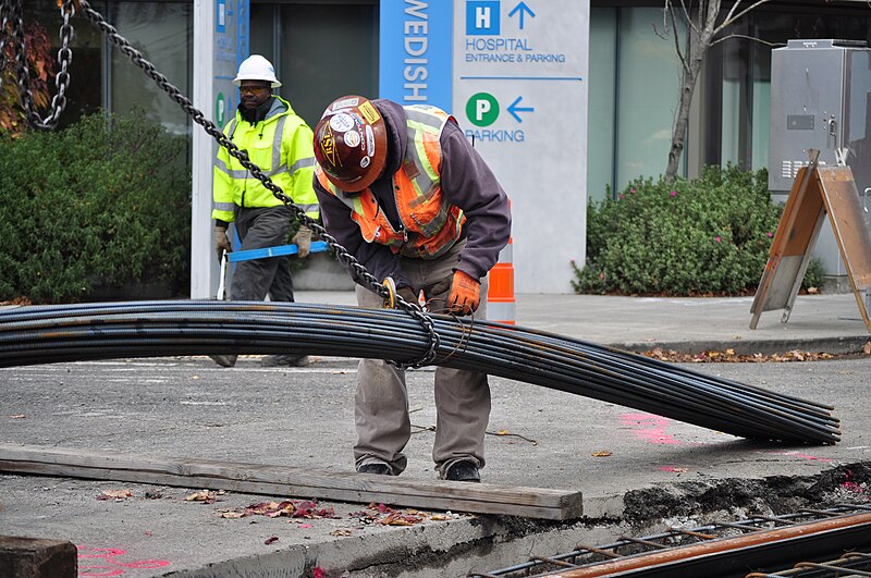 File:Seattle - laying trolley tracks on Broadway at James 13.jpg