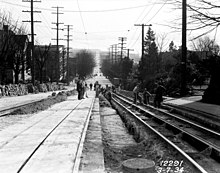 Roadwork in 1934 exposed the tracks and center slot atop the second tunnel of the Counterbalance Seattle - roadwork on the Queen Anne counterbalance, 1934.jpg