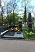 The tombstones of Stanislav Lukiyanchenko (center) and writer Lazar Karmen (right)