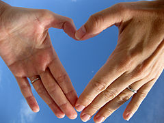 Two left hands forming a heart shape.jpg