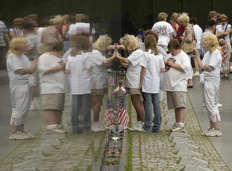 File:US Navy 030616-N-9593R-153 Visitors to the Vietnam Veterans Memorial Wall, take rubbings of names.jpg