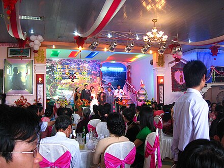 A Vietnamese wedding reception held at a venue.