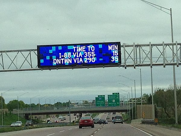 LED sign over Illinois State Route 390/Elgin-O'Hare Tollway in Roselle, Illinois showing remaining travel times