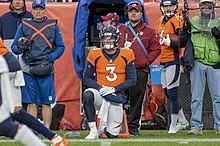 Lock on the sidelines during a game WFT vs. Broncos (51651272550).jpg