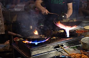 Wok cooking and fire by romainguy.jpg