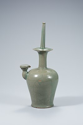 Celadon Buddhist ritual sprinkler with phragmites and wild goose design in relief