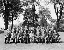 Mackenzie King (seated centre, in light suit) and his cabinet, 1945. St. Laurent is seated at far left, with C.D. Howe seated third from left. 16th Canadian Ministry.jpg